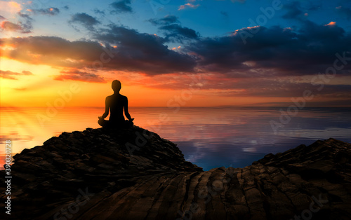 woman practicing yoga at sunset. Have a positive mindset.