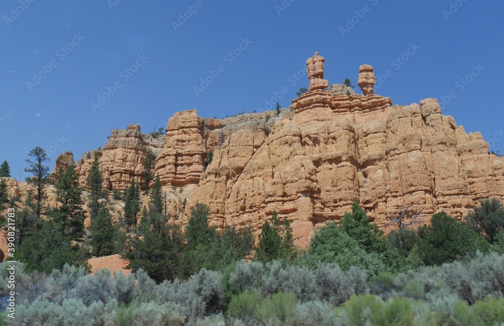 Scenic roadside view of geologic formations and buttes in Arizona.
