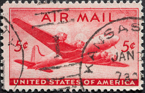 USA - Circa 1946 : a postage stamp printed in the US showing the DC-4 Skymaster on the Airmail postal stamp large