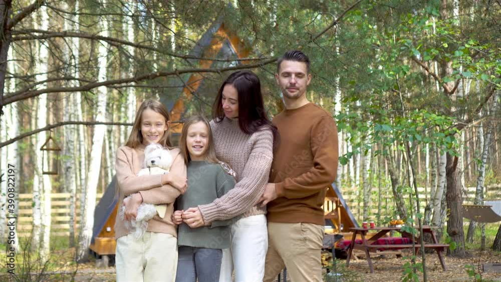 Beautiful family walking at autumn warm day Beautiful family walking at autumn warm day