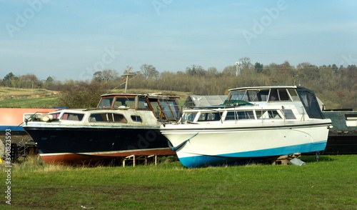 Old obsolete river boats in a field © simonXT2
