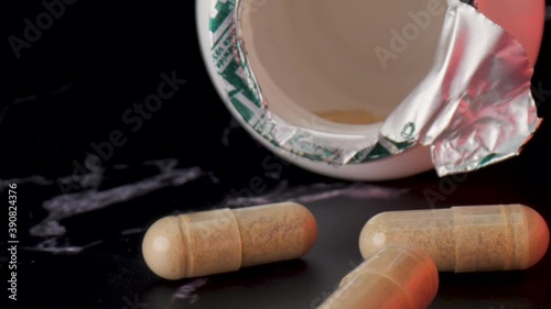 Close up of a bottle of pills. Covid-19 theme photo