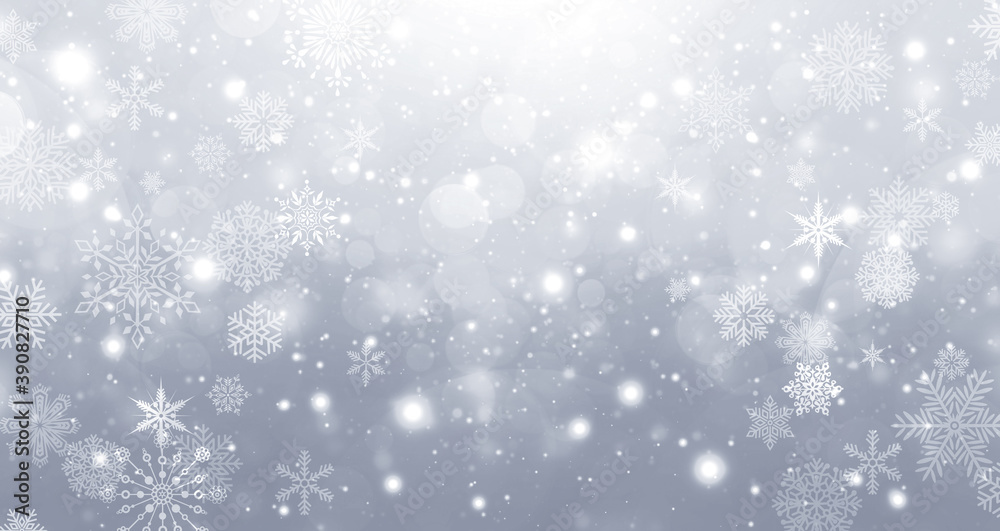 Winter silver and white gradient bokeh background with circles and snowflakes Winter silver and white gradient bokeh background with circles and snowflakes