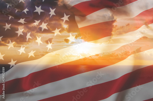 American transparent flag over the sunrise in the background, refer to the nation U.S.A. pride and freedom hope in business world abstract concept