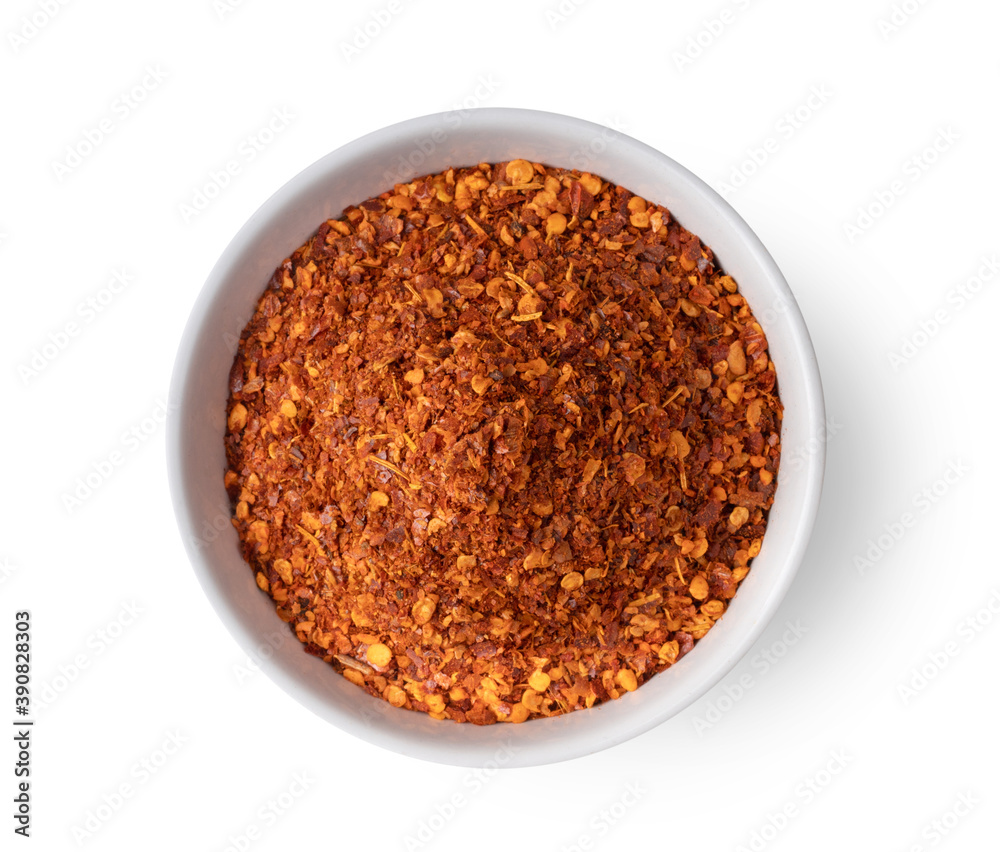 pepper powder spice in white bowl isolated on white background pepper powder spice in white bowl isolated on white background
