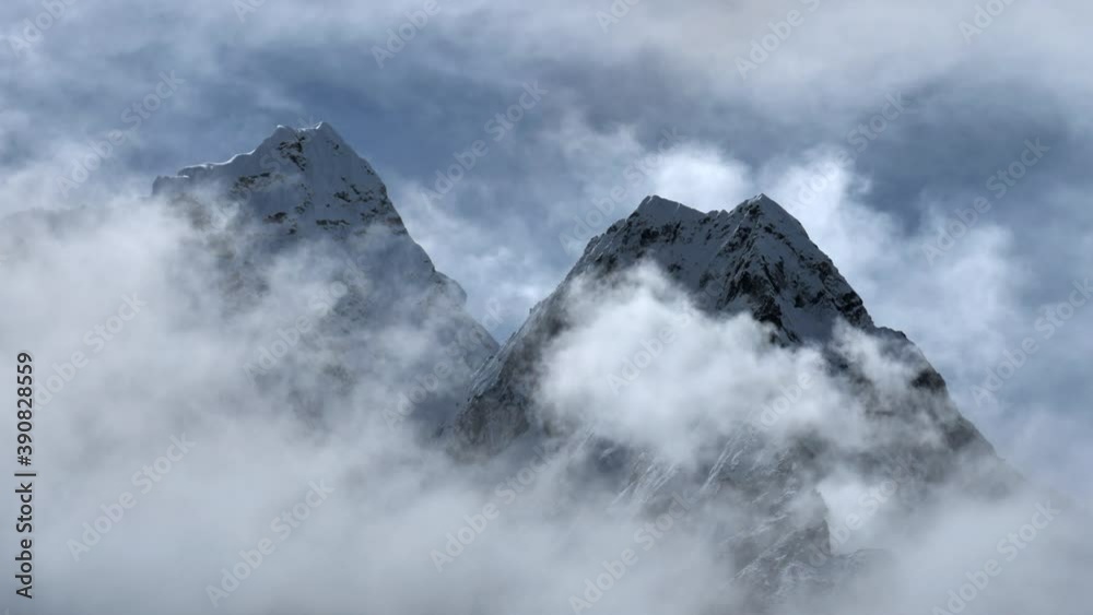 Top of a mount in the clouds, zoom out shot Top of a mount in the clouds, zoom out shot