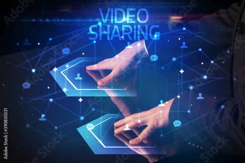 Navigating social networking with VIDEO SHARING inscription, new media concept