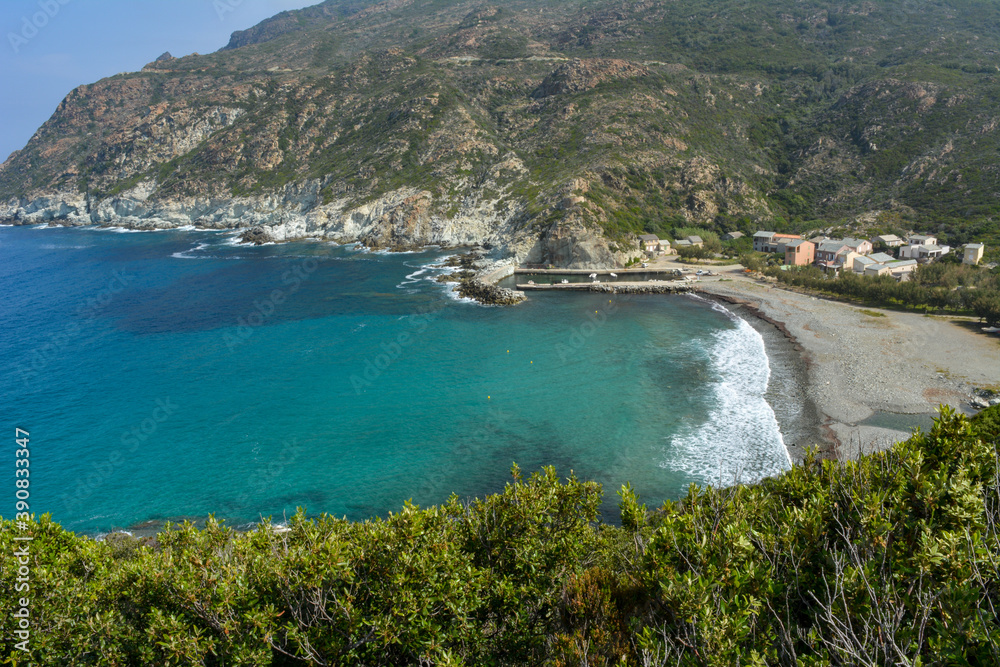 Aerial view of Marine di Giottani, one of the most remote beaches of the western side of Cap Corse, the northern peninsula of the island famous for its wild landscape. Corsica, France 