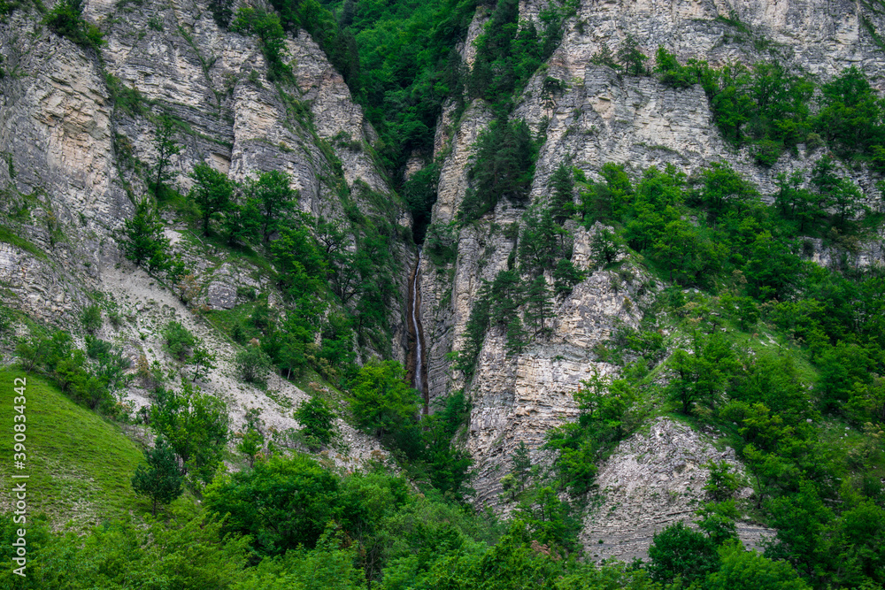 waterfall in the mountains waterfall in the mountains