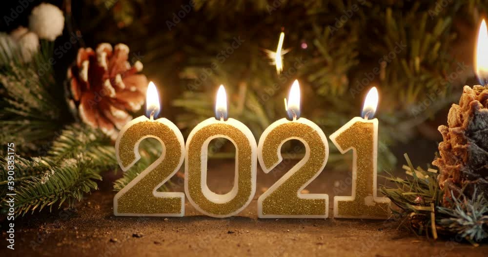New Year's figures 2021 on the backdrop of sparklers. 