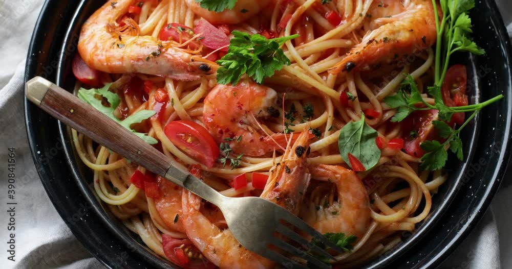 Pasta with shrimps in tomato sauce. Rotation Pasta with shrimps in tomato sauce. Rotation