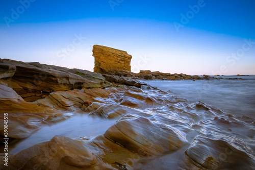 Long Exposure image of rocks on a beach