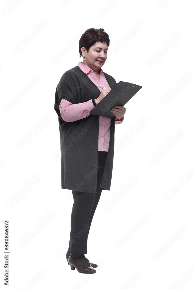 in full growth. confident mature woman with clipboard in full growth. confident mature woman with clipboard