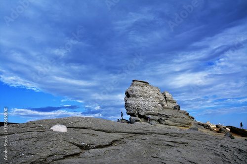 SINAIA, ROMANIA - Jul 28, 2017: The Sphinx in Bucegi National Park, Romania - Natural rock formation photo