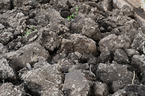 Dug up soil. Large comas of land. © Olga