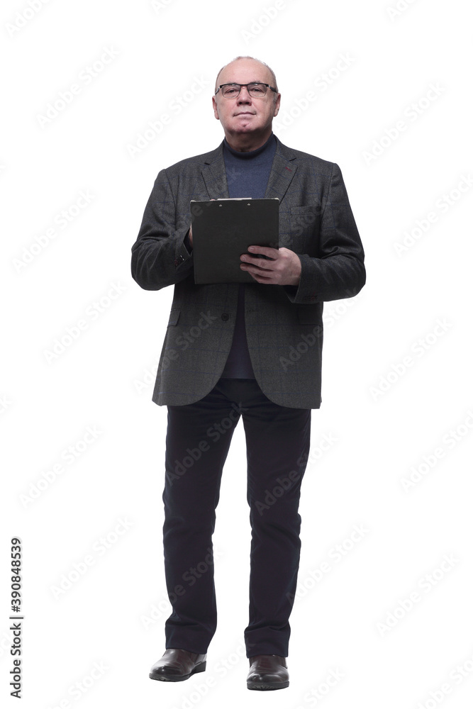 in full growth. business man making entries in the clipboard in full growth. business man making entries in the clipboard