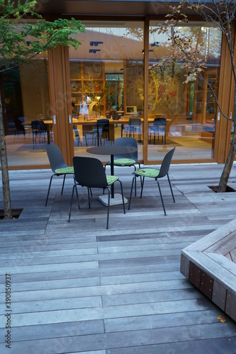 Wood deck seats in the courtyard © travelers.high