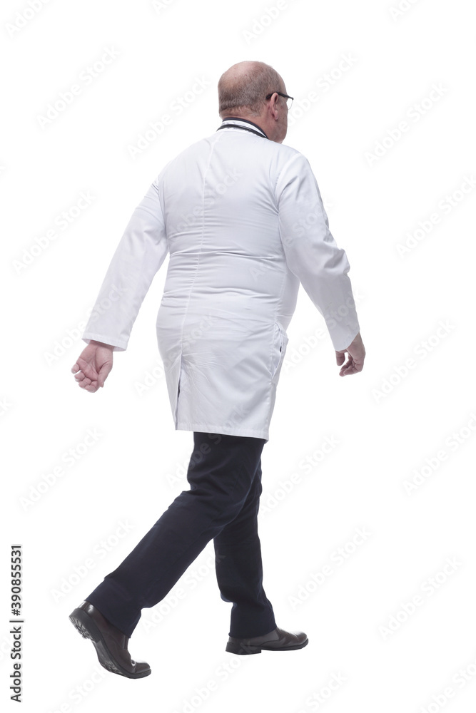 rear view. senior doctor confidently goes forward rear view. senior doctor confidently goes forward