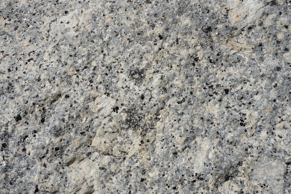 Natural stone grey granite texture and background. Biotite Granite rock texture. Natural stone grey granite texture and background. Biotite Granite rock texture.