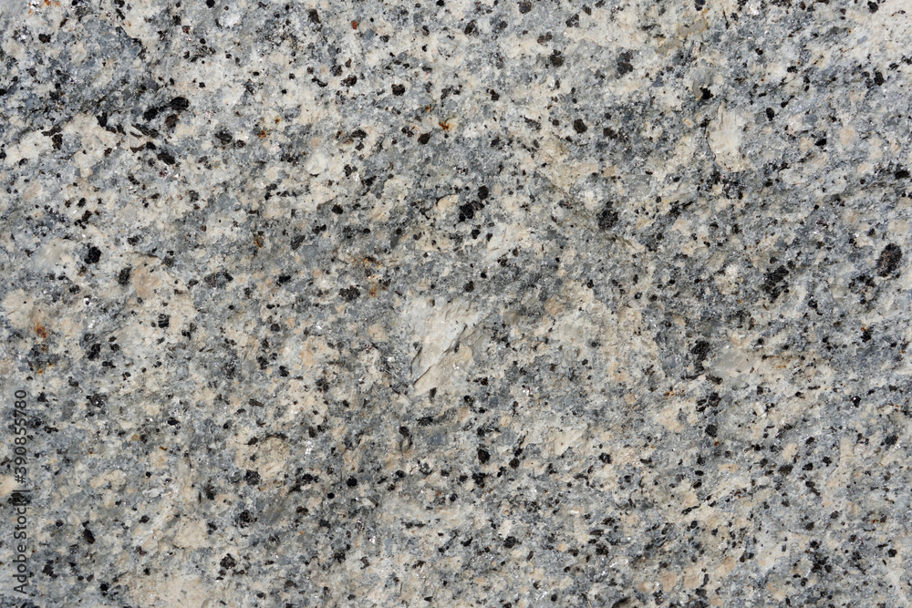 Natural stone grey granite texture and background. Biotite Granite rock texture. Natural stone grey granite texture and background. Biotite Granite rock texture.