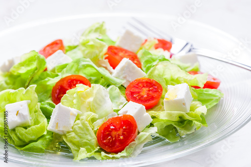 salad with fresh vegetables, feta cheese and tomatoes