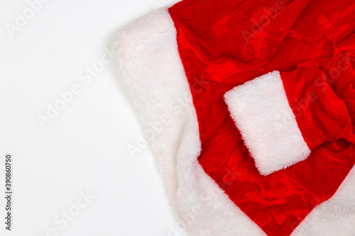 Part of Santa Claus clothing isolated on white. Red fur. Flat lay.