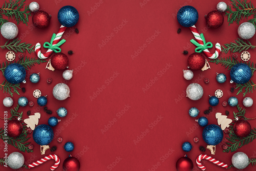 New Year's, festive decor on a red background. Copy space, flat lay, mock up, top view New Year's, festive decor on a red background. Copy space, flat lay, mock up, top view