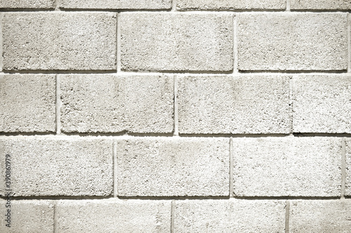 White brick wall background, texture of a flat highlight brick wall.