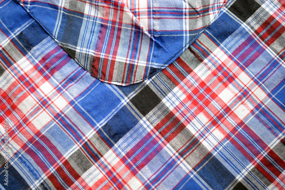 Multicolored checkered cotton fabric, pattern and texture of the fabric.