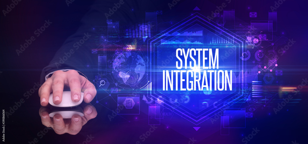 hand holding wireless peripheral with SYSTEM INTEGRATION inscription, cyber security concept hand holding wireless peripheral with SYSTEM INTEGRATION inscription, cyber security concept