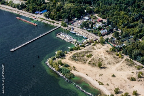 Aerial shot of yacht club and green water of the river Volga in Ulyanovsk, Russia.