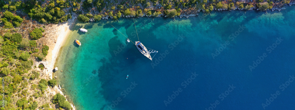 Aerial drone ultra wide panoramic photo of tropical exotic emerald sea wit turquoise crystal clear waters in asian destination island