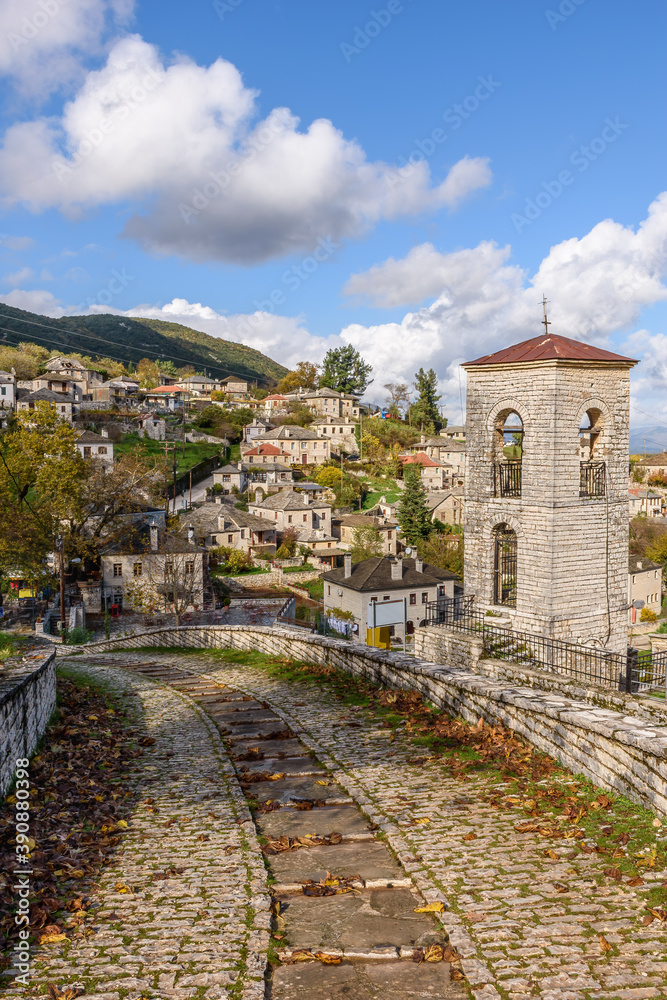 Traditional stone road leading to Aristi village    during  fall season in Zagori Greece.