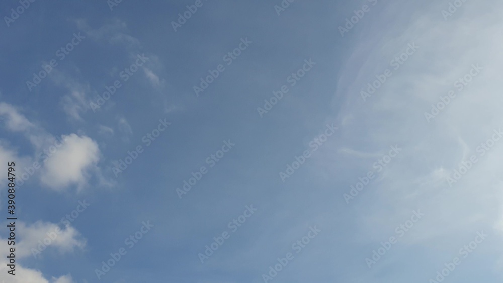 white clouds disappear in the hot sun on blue sky. Time-lapse motion clouds, blue sky background and sun white clouds disappear in the hot sun on blue sky. Time-lapse motion clouds, blue sky background and sun