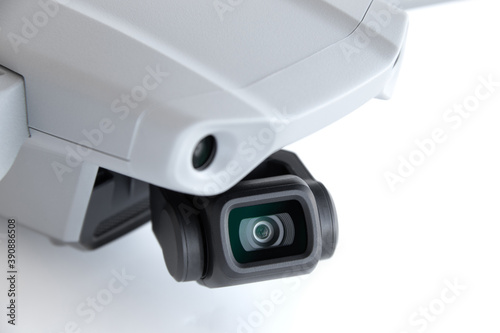 Close-up of a drone camera on a white background.