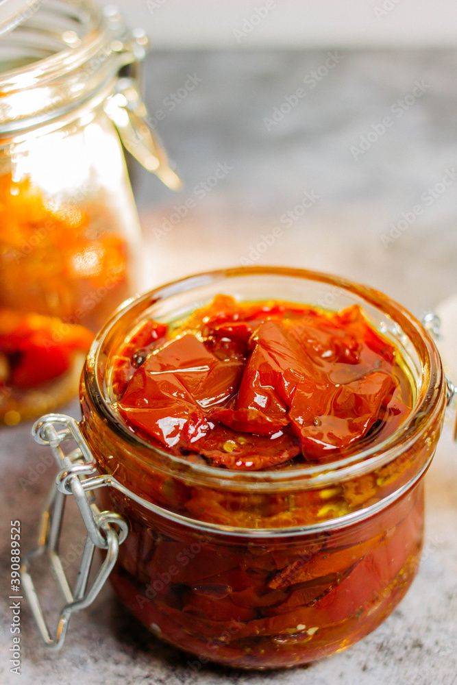 sun-dried tomatoes with olive oil in a jar sun-dried tomatoes with olive oil in a jar