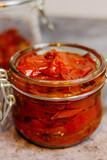 sun-dried tomatoes with olive oil in a jar