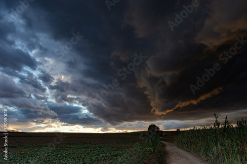 Storm clouds at sunset in the Gallecs natural park photo