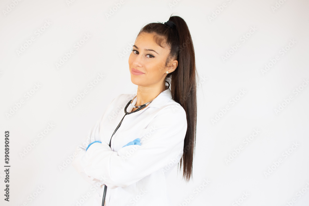 Woman in doctor uniform over white background. Woman in doctor uniform over white background.