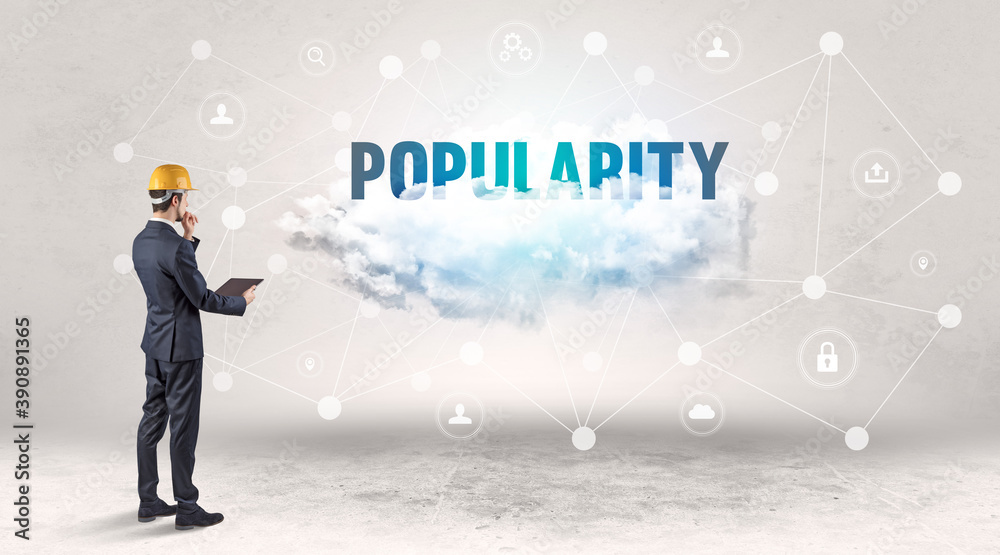 Engineer working on a social media concept with POPULARITY inscription Engineer working on a social media concept with POPULARITY inscription