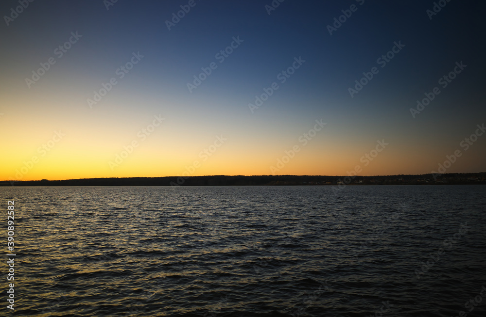 Burning sunset at river horizon landscape background