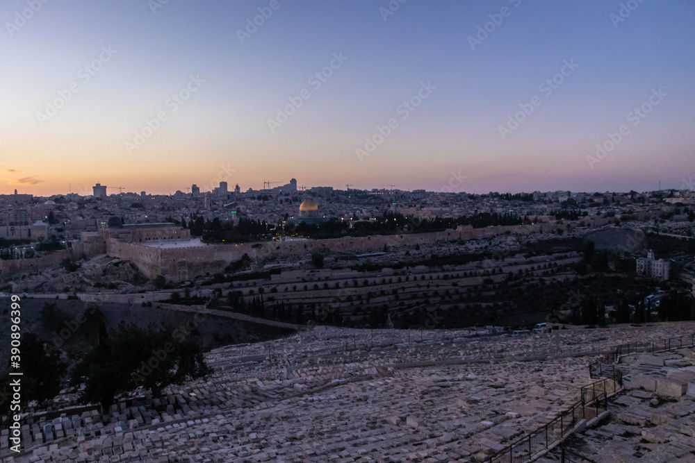 Jewish cemetery on the Mount of Olives in Jerusalem at sunset