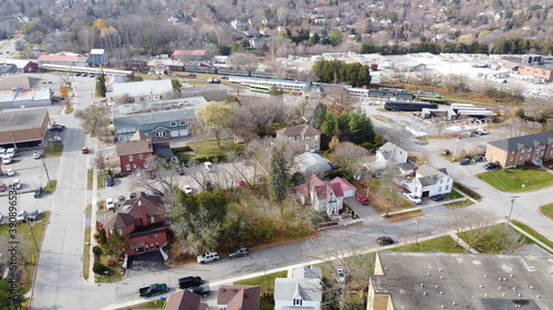 Panoramic Aerial View of a Suburban Town in Canada with Low Rise Buildings and Busy City Center and Roadway