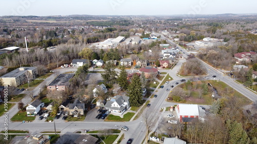Panoramic Aerial View of a Suburban Town in Canada with Low Rise Buildings and Busy City Center and Roadway photo