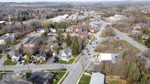 Panoramic Aerial View of a Suburban Town in Canada with Low Rise Buildings and Busy City Center and Roadway photo