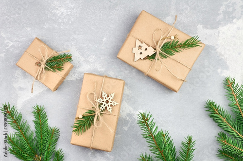 Christmas flat lay with gift boxes and fir tree branches