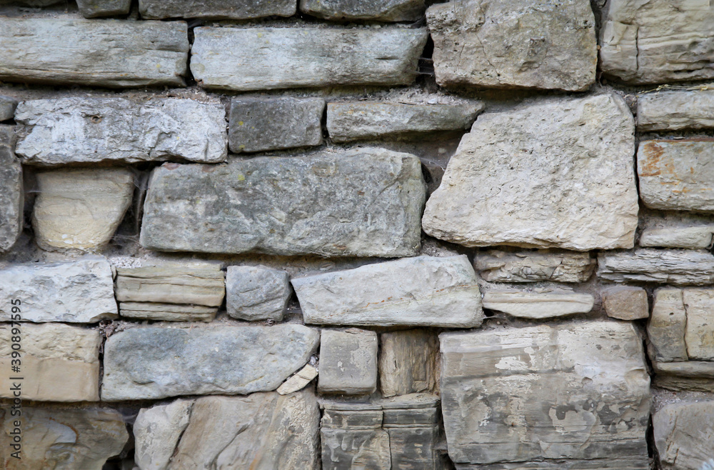 Eine Felswand, eine Wand aus vielen Bruchsteinen als Textur. Eine Felswand, eine Wand aus vielen Bruchsteinen als Textur.