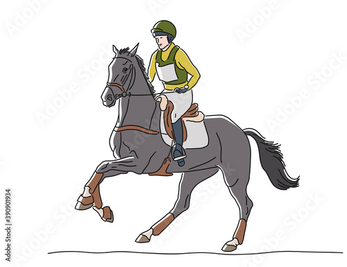Equestrian rider cantering on horse at the time of the competition