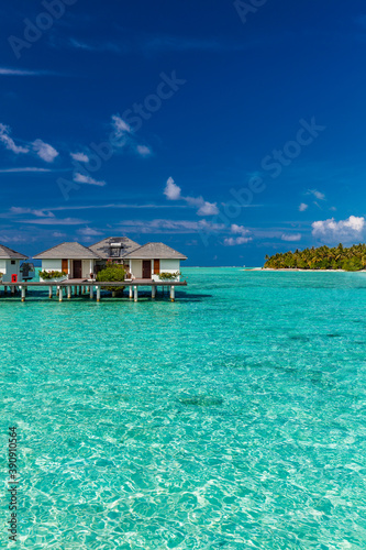 Fototapeta Naklejka Na Ścianę i Meble -  Beautiful summer beach paradise with sandy beach and villas