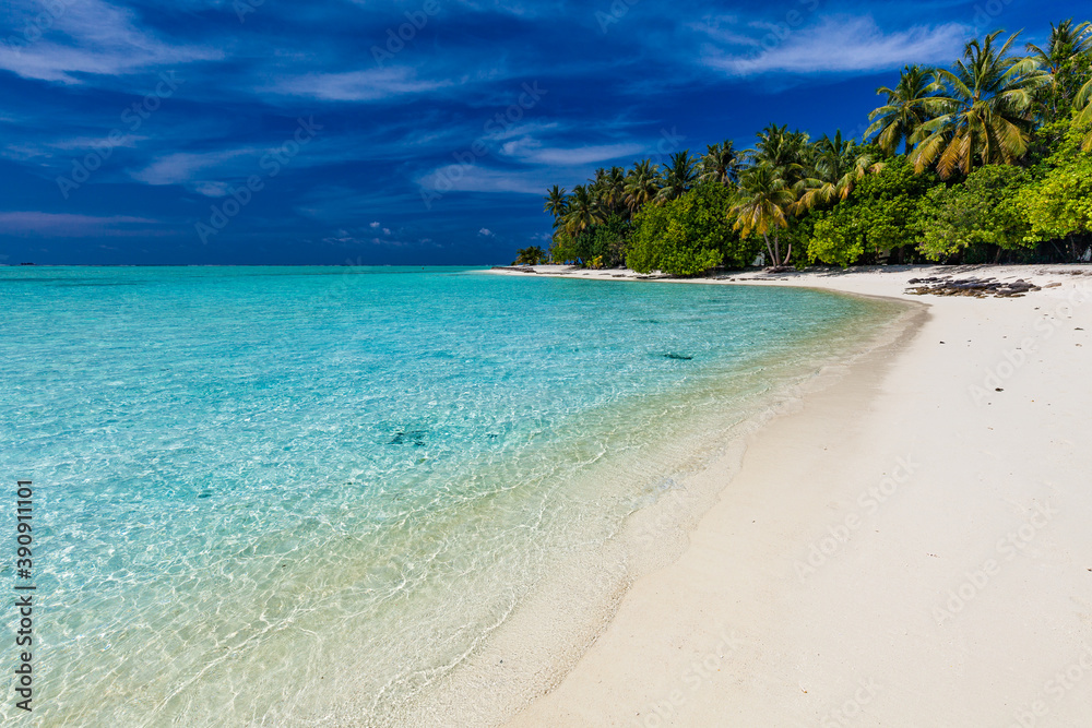 White sandy beach in Maldives with amazing blue lagoon